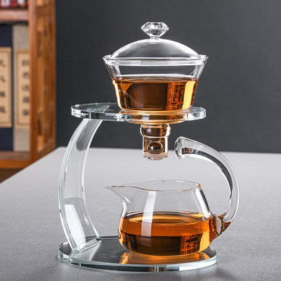 Automatic glass creative tea brewing device for Kung Fu tea set, simple lazy tea maker for home use, tea brewing pot set.